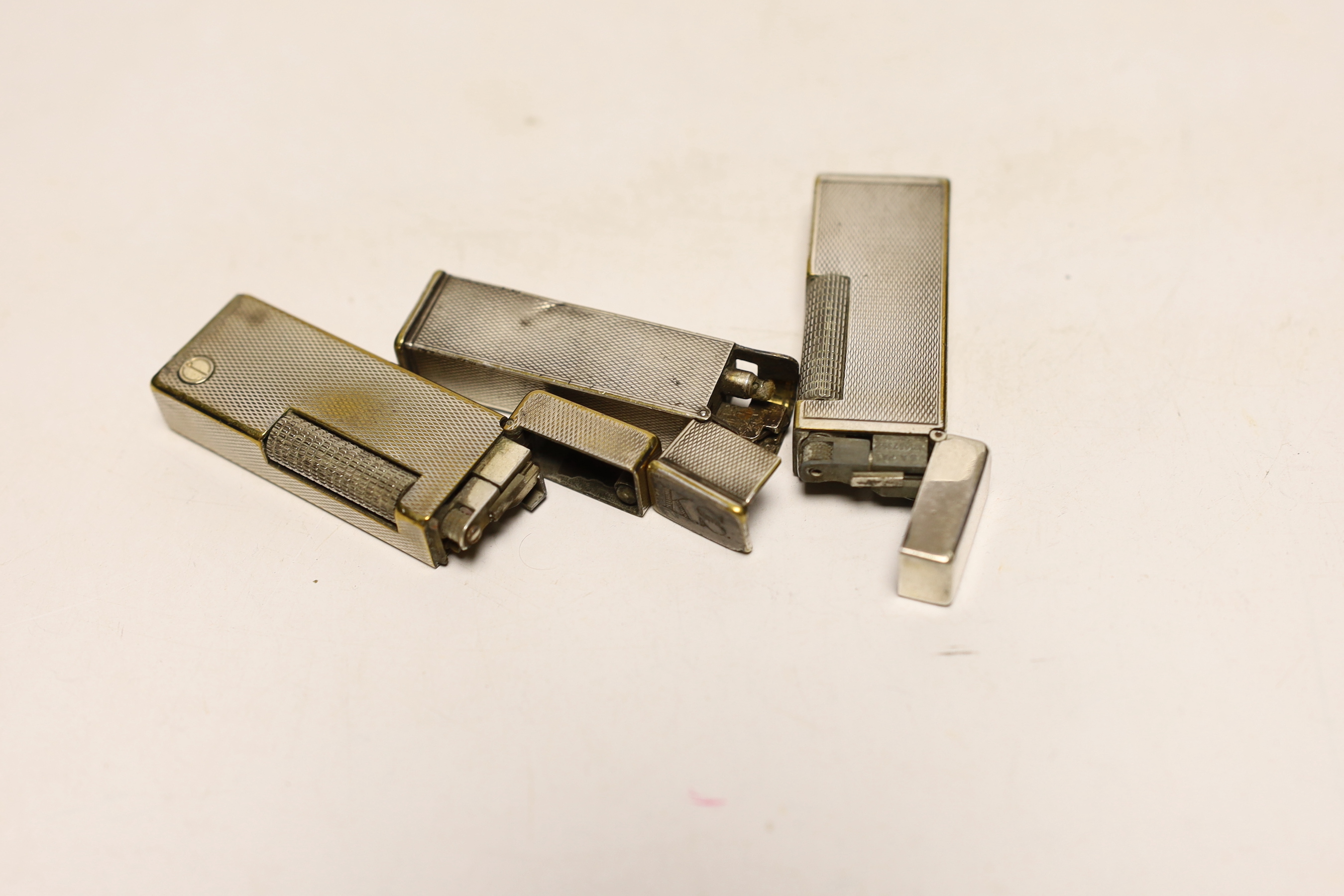 Three assorted Dunhill lighters